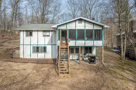 9325 Golf Prt #107, Canadian Lakes, MI 49346