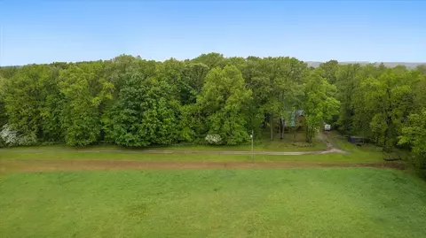 Exterior - 65 N Brown, Bailey, MI 49303 photo 5 of 11