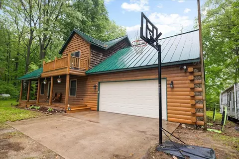 Exterior - 65 N Brown, Bailey, MI 49303 photo 9 of 11
