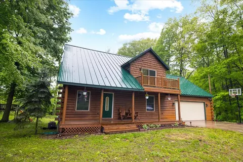 Exterior - 65 N Brown, Bailey, MI 49303 photo 3 of 11