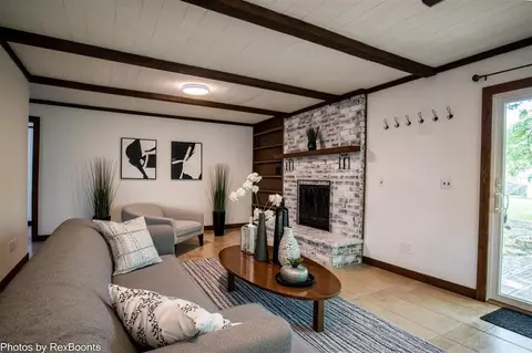 Living - 135 E Commerce, Grant, MI 49327 photo 1 of 2