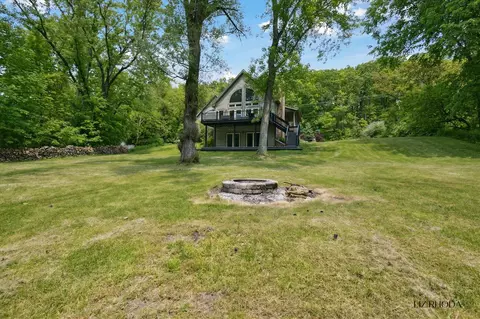Exterior - 10058 Fulton, Ada, MI 49301 photo 9 of 14