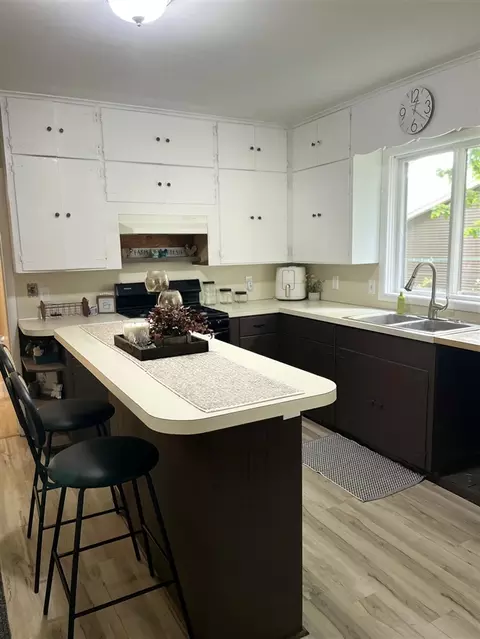 Kitchen - 91 E Commerce, Grant, MI 49327 photo 1 of 2