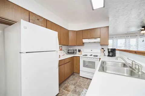 Kitchen - 5015 Main, Onekama, MI 49675 photo 5 of 10