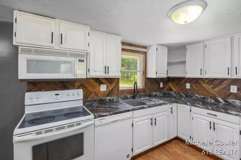 Kitchen - 9583 E 5 Mile, Big Rapids, MI 49307 photo 2 of 3
