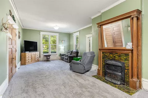 Living - 341 E Main, Ionia, MI 48846 photo 1 of 2