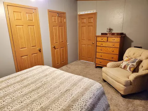 Bedroom - 3268 W W Rdg, White Cloud, MI 49349 photo 6 of 9