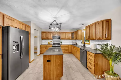 Kitchen - 4101 White Pne, Dorr, MI 49323 photo 3 of 4