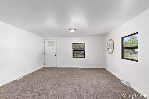 Living - 1086 Kathleen Dr, Stanton, MI 48888 photo 1 of 3