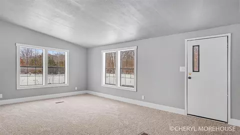 Living - 2939 138th, Dorr, MI 49323 photo 2 of 3