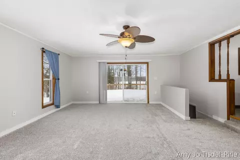 Living - 8411 Spring, Stanton, MI 48888 photo 1 of 3