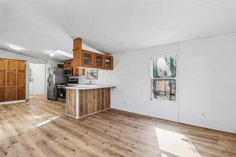Living - 5238 Tilmann, Weidman, MI 48893 photo 4 of 4