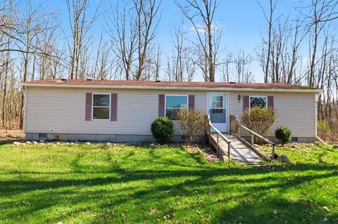 5238 Tilmann, Weidman, MI 48893