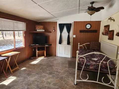 Bedroom - 5247 N Access, Irons, MI 49644 photo 1 of 2