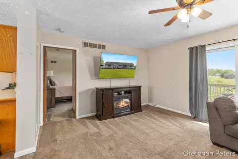 Living - 3136 140th, Dorr, MI 49323 photo 3 of 5