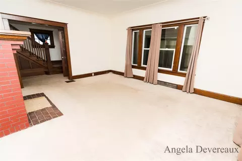 Living - 110 E Main, Edmore, MI 48829 photo 2 of 4