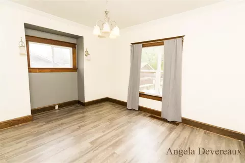 Living - 110 E Main, Edmore, MI 48829 photo 1 of 4