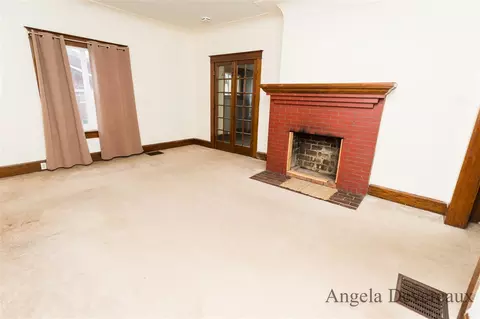 Living - 110 E Main, Edmore, MI 48829 photo 3 of 4