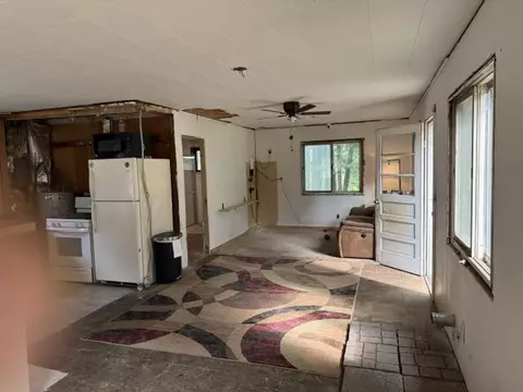 Living - 3105 N Evergreen, White Cloud, MI 49349 photo 1 of 2