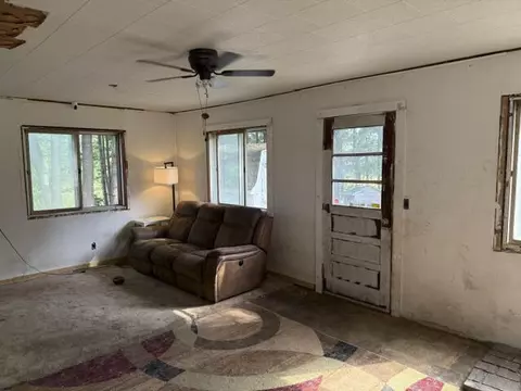 Living - 3105 N Evergreen, White Cloud, MI 49349 photo 2 of 2