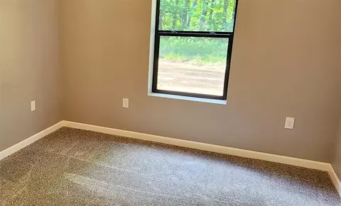 Bedroom - 643 S Ashton Ln, White Cloud, MI 49349 photo 2 of 4