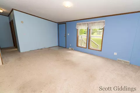 Living - 206 E 1st, Stanton, MI 48888 photo 2 of 8