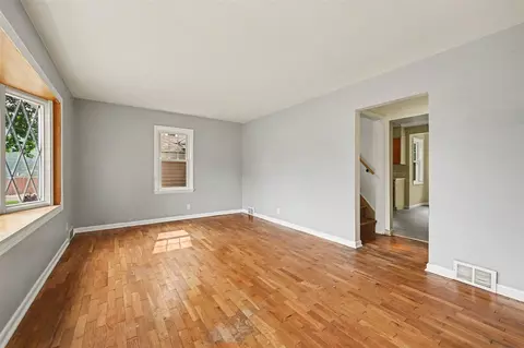Living - 1050 Bloomfield, Plainwell, MI 49080 photo 1 of 2