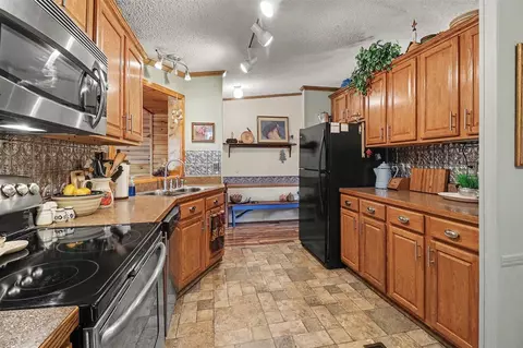 Kitchen - 6809 W Deer, Mears, MI 49436 photo 3 of 4