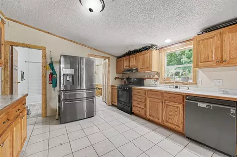 Kitchen - 5847 W Austrian Pne, Grant, MI 49327 photo 2 of 4