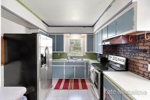 Kitchen - 75 4th, Plainwell, MI 49080 photo 4 of 6