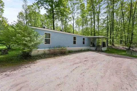 Exterior - 1617 N Betsie Riv, Interlochen, MI 49643 photo 4 of 9