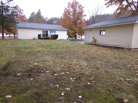 Exterior - 8727 Arbutus, Farwell, MI 48622 photo 9 of 15