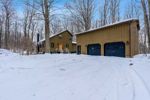 Exterior - 828 E Sullivan Woods, Cedar, MI 49621 photo 2 of 6
