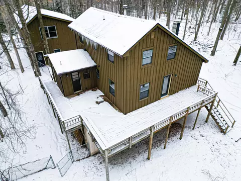Exterior - 828 E Sullivan Woods, Cedar, MI 49621 photo 6 of 6