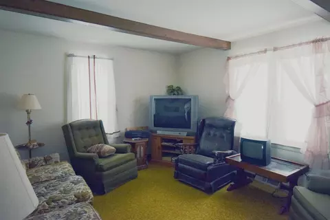 Living - 46 E Clarence, Harrison, MI 48625 photo 1 of 2