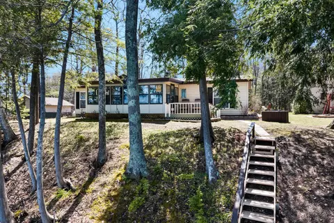 Exterior - 8790 Deadstream, Honor, MI 49640 photo 1 of 9