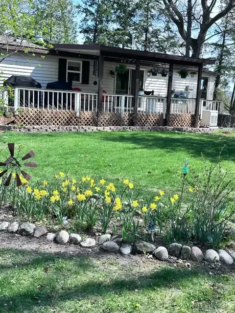 Exterior - 8790 Deadstream, Honor, MI 49640 photo 4 of 9