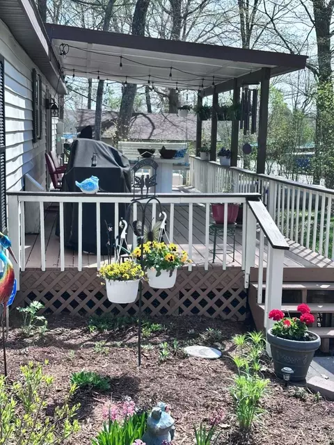 Exterior - 8790 Deadstream, Honor, MI 49640 photo 7 of 9