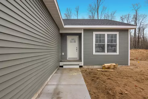 5653 Chokeberry, Grawn, MI 49637