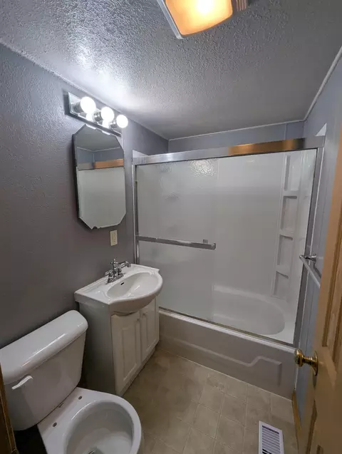Bath - 216 N West, Au Gres, MI 48703 photo 1 of 2