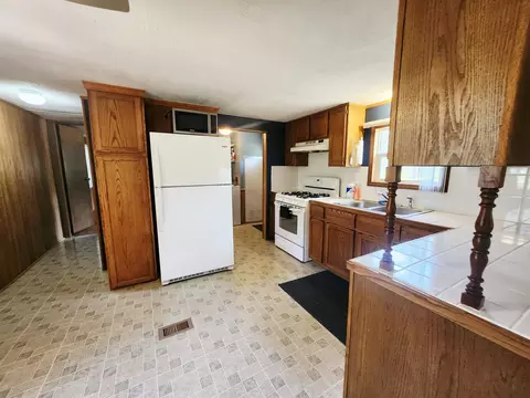 Kitchen - 3764 E North Down Riv #LOT : 7, Grayling, MI 49738 photo 5 of 7
