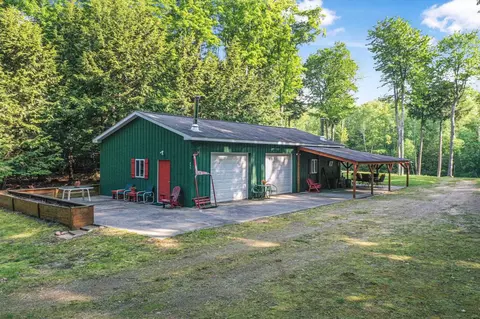 Exterior - 405 E Shetland, Cedar, MI 49621 photo 2 of 11