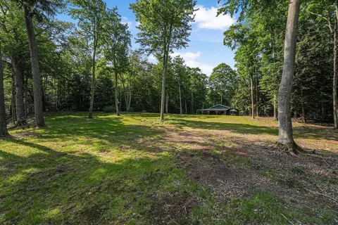 Exterior - 405 E Shetland, Cedar, MI 49621 photo 5 of 11