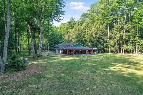 Exterior - 405 E Shetland, Cedar, MI 49621 photo 6 of 11