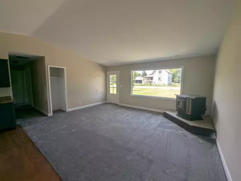 Living - 322 E Main, Turner, MI 48765 photo 2 of 3