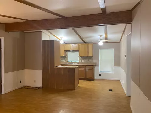 Living - 7929 E 10, Manton, MI 49663 photo 2 of 3