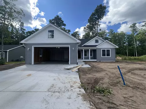5669 Chokeberry, Grawn, MI 49637
