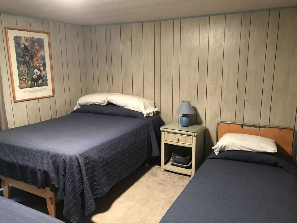 Bedroom - 5360 Quarterline, Kewadin, MI 49648 photo 5 of 6