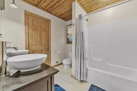 Bath - 525 E Oak, Leland, MI 49654 photo 1 of 5
