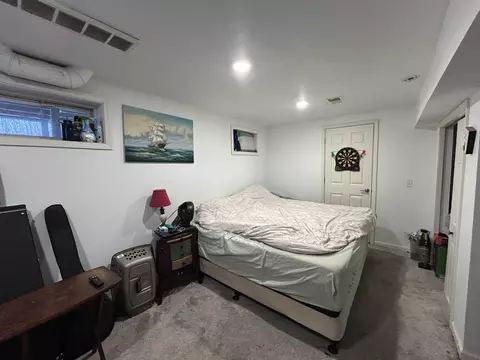 Bedroom - 7467 E Higgins Lk, Roscommon, MI 48653 photo 4 of 5